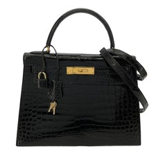 Hermès Kelly 28cm Crocodile luxury bag - market price $62,021, trending down 44.0% over 6 months