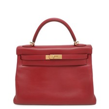 Hermès Kelly 32cm Box luxury bag - market price $11,002, trending down 35.6% over 6 months